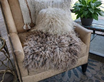 Handmade felted sheep wool fleece or pillow