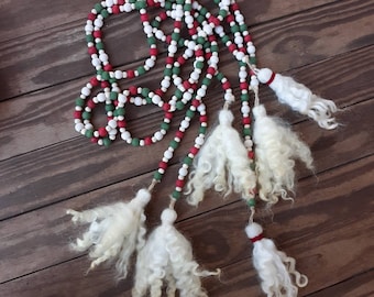Red white and green wood beaded swag garland with tassels