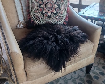 Hand made black Felted sheep fleece or pillow