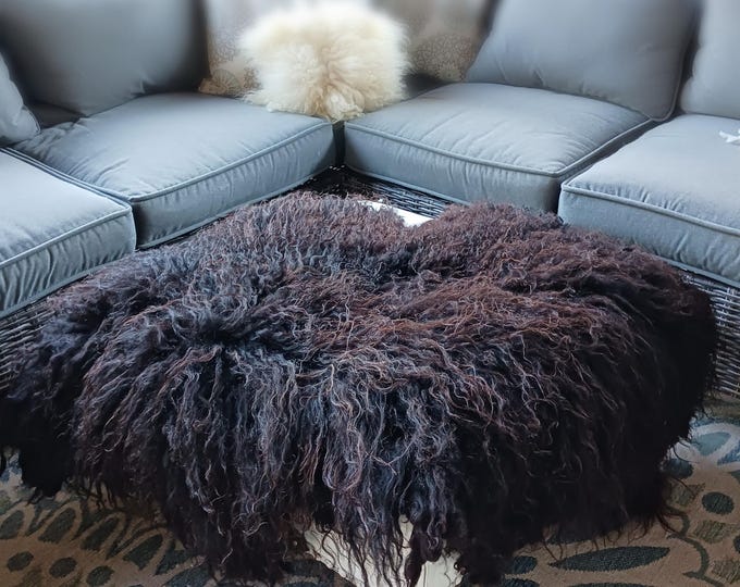 Featured listing image: Hand made black felted lamb fleece throw blanket or rug