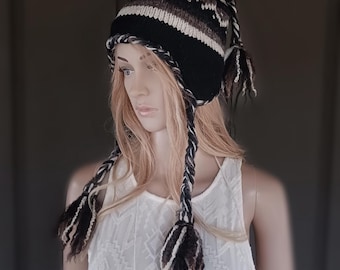 Hand knit 100% wool ear flap hat with tassels lined with microfleece