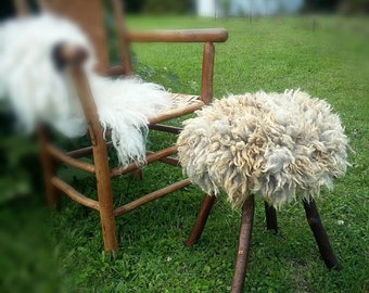 Hand crafted round wood footstool or ottoman with sheep friendly "sheepskin"