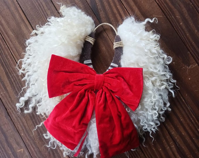 Featured listing image: Horseshoe Christmas wreath fiber art felted wool