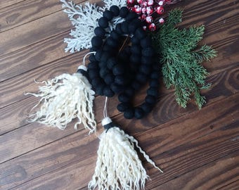 Christmas garland swag banner red or black felted balls with ivory wool tassels