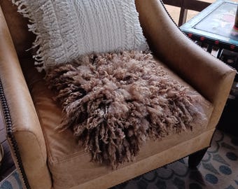 Handmade felted sheep wool fleece or pillow