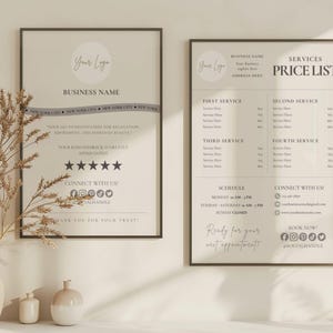 May include: Two framed prints with text, one a business sign with a logo and the words "Business Name", the other a price list. The prints are in neutral tones, with a vase and decorative plants in the foreground.