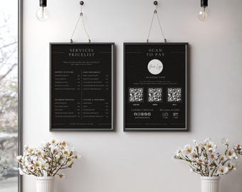 Puede incluir: Dos letreros negros enmarcados cuelgan de una pared blanca. El letrero de la izquierda dice "SERVICES PRICELIST" y enumera los servicios y precios. El letrero de la derecha dice "SCAN TO PAY" con un logotipo, códigos QR y opciones de pago. Arreglos florales en primer plano.
