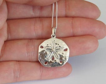 Jewel Tie 925 Sterling Silver Sand Dollar Pendant Charm 19mm x 27mm Jewel Tie 925 Sterling Silver Sand Dollar Pendant Charm 19mm x 27mm
