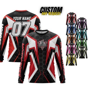 May include: Custom motocross jersey with a black, red, and white design. The jersey features a honeycomb pattern, the text "YOUR NAME" and the number "07". Additional jerseys in various colors are displayed.
