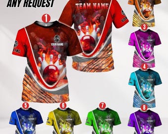 May include: A collection of bowling-themed t-shirts in various colors, each featuring a bowling ball and pins design with flames. The shirts have a customizable area for a team name and the text "CUSTOM ANY REQUEST".