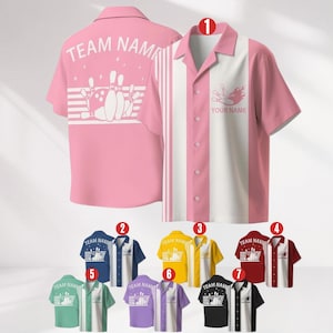 May include: Pink bowling shirt with white vertical stripe and bowling graphic. The shirt has a button-down front and a classic collar. The back of the shirt has the text "TEAM NAME" and a bowling pin graphic. Additional color options are available.