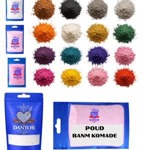 May include: An assortment of colorful powders and packaged products. The image features various shades of powders, including brown, black, gray, orange, white, yellow, green, purple, teal, blue, pink, and red. Several packages with the "DANTOR" logo are also visible.