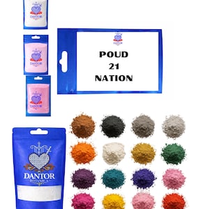May include: An assortment of colorful powders and packaged products. The image features various shades of powder, including brown, black, and green, alongside pouches with the "Dantor" logo and the text "POUD 21 NATION".
