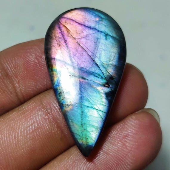 レインボーラブラドライトペアー宝石：手磨きの華やかな石（36x19x6 mm