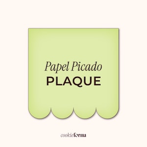 May include: A light green plaque with the words "Papel Picado PLAQUE" in dark brown lettering. The plaque has a scalloped bottom edge and a light beige background. The cookieforma logo is at the bottom.