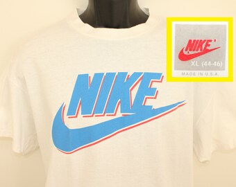 light blue and red nike shirt