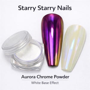 May include: An image of nail art supplies. The image shows a jar of white powder, two nail tips, and the text "Starry Starry Nails" and "Aurora Chrome Powder White Base Effect". One nail tip is iridescent purple and gold, and the other is pearlescent white.