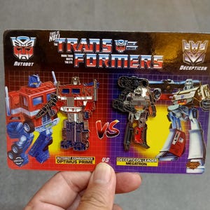Diecast Pin G1 TF Optimus Prime VS Megatron Transformers Diaclone