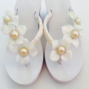 Bridal Flip Flops and Wedges. Bling Wedding Flip Flops. Custom Made Bridal Shoes. Flower Beach Wedding Sandals. Destination Beach Wedding.