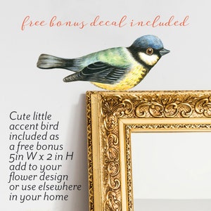 May include: A watercolor illustration of a bluebird with yellow accents perched on a gold ornate picture frame. The text "free bonus decal included" is written above the bird. The text "Cute little accent bird included as a free bonus 5in W x 2 in H add to your flower design or use elsewhere in your home" is written below the bird.