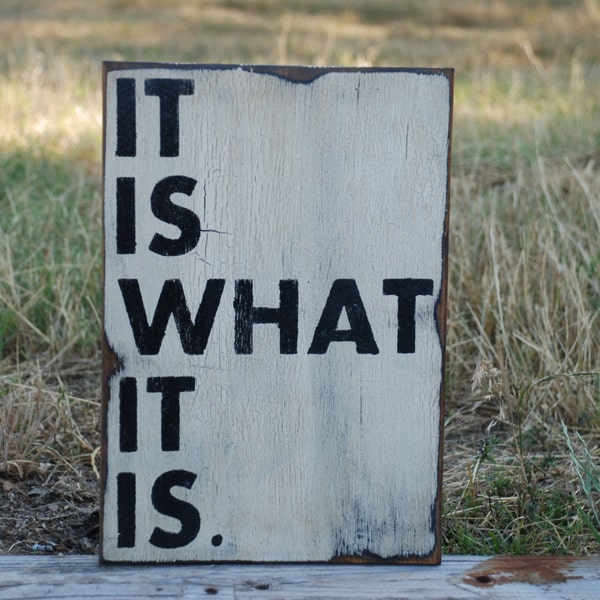 Wooden sign It is what it is sign made from reclaimed plywood