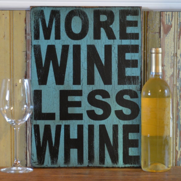 Wooden sign made from reclaimed plywood More wine less whine