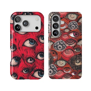 May include: Two smartphone cases featuring a vibrant red background covered in a dense, repeating pattern of detailed human eyes with blue irises, dark lashes, and intricate line work, including a camera cutout on the upper left side.