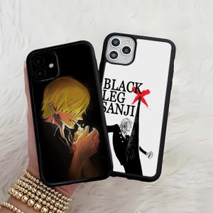 May include: Two black phone cases with anime character designs. One case features a blonde character with a lighter, the other displays the text "BLACK LEG SANJI" with a red "X" and a black and white illustration.
