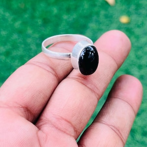 Minimalist Black Onyx Ring: Oval Sterling Silver, Protective Stone