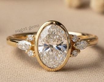 Solitaire Oval Moissanite Bezel Set Gold Ring With Side Stone, Elegant Women’s Bridal Jewelry