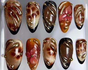 Uñas postizas florales 3D: Diseño de uñas otoñales con almendras largas