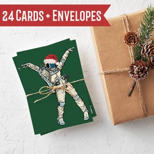 Dancing Astronaut Christmas Cards 24 Pack of Holiday Stationery with Envelopes - Funny Space Men & Women with Santa Hats RR0 6062