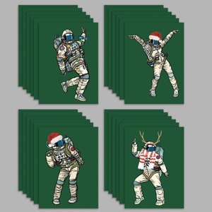 Lot de 24 cartes de Noël astronaute dansant avec enveloppes - Funny Space hommes et femmes avec bonnets de père Noël RR0 6062
