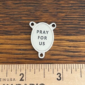 Pray for Us on back of St Christopher rosary centerpiece