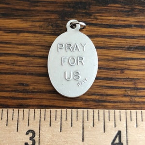 St Joseph the Worker back of medal with Pray for Us