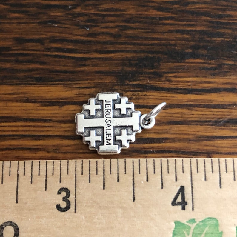Jerusalem Cross Crusader Charm next to ruler for size