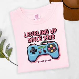 Leveling Up Since 1999 Gamer T-Shirt Retro Pixel Controller Shirt Birthday Gift for Video Game Lover Funny Gaming Tee for Men and Women