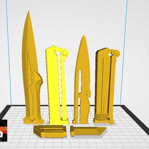 May include: A collection of yellow 3D-printed objects, including stylized blades and rectangular components. The objects are arranged on a black and white grid surface. The objects vary in size and design, with some featuring intricate details.