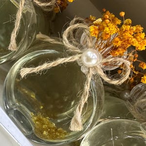 Set of 10 Decorative Glass Bottles with Dried Flowers  Pearl Detail, Empty Favor Bottles for Cologne, Perfume, Wedding & Party Gifts