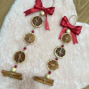 Dried Orange  Cinnamon Door Hanger – Set of 2 Rustic Wall Ornaments with Red Bows for Christmas or Farmhouse Decor