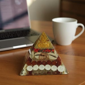 “meditation decor pyramid featuring rudraksha and gomti chakra layers”