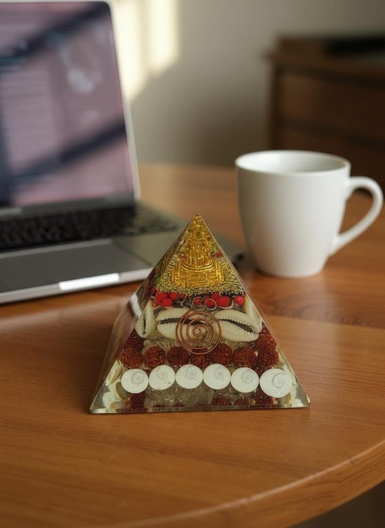 “meditation decor pyramid featuring rudraksha and gomti chakra layers”