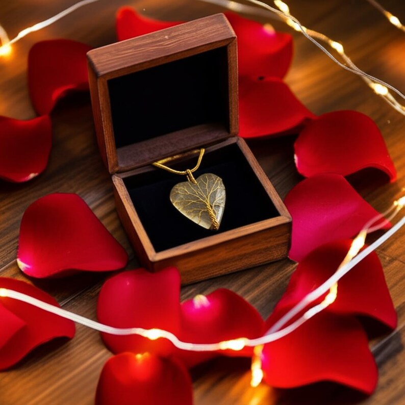 Handmade Indian jewelry: Moonstone heart pendant featuring a detailed tree of life wire wrap.