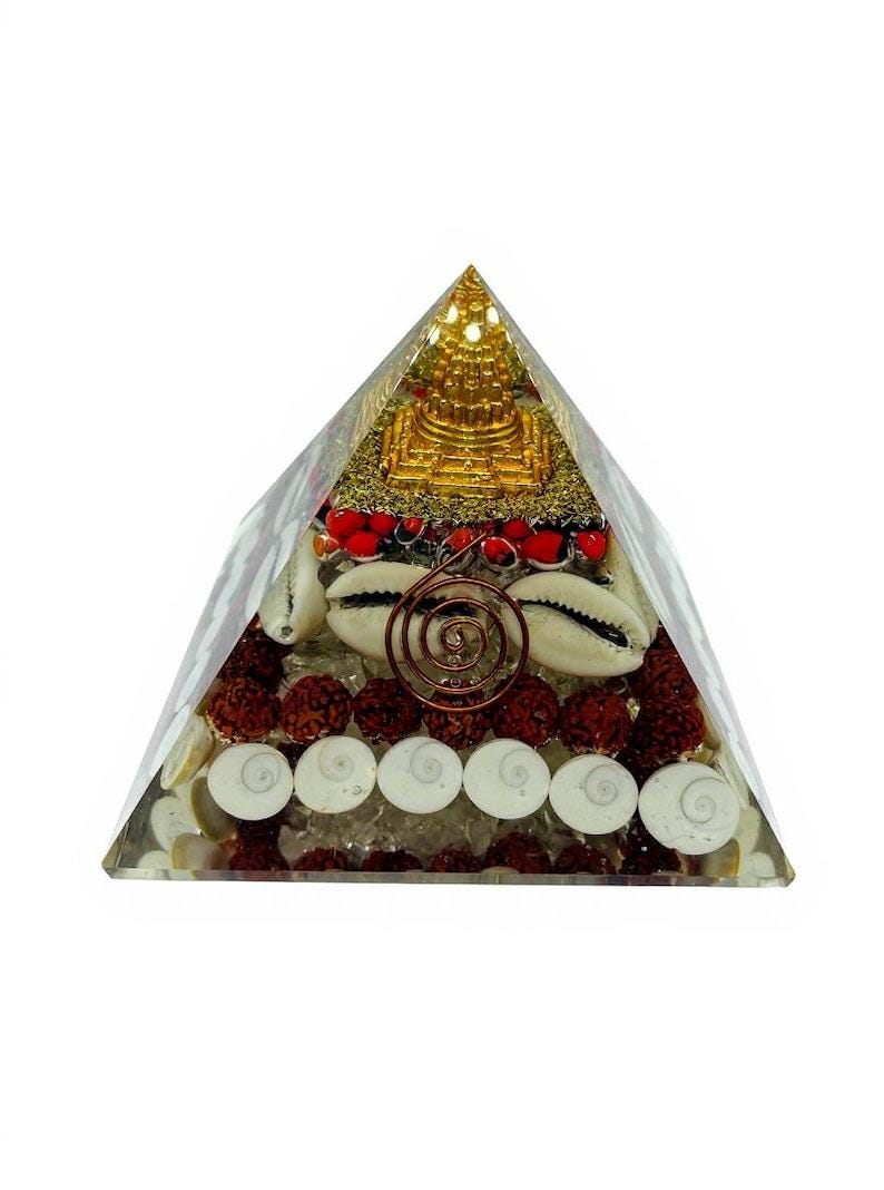 “handmade buddha orgone pyramid with rudraksha beads and gomti chakra discs”