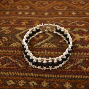 Black wood karungali bracelet with silver detailing