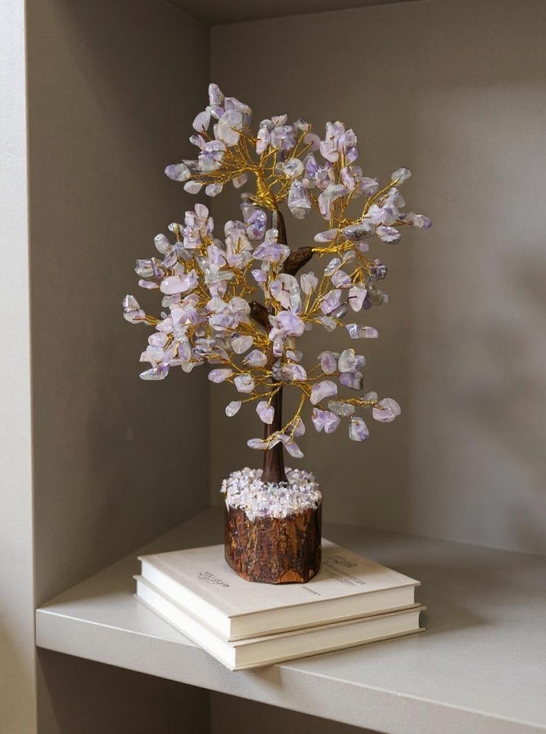 Spiritual home décor: amethyst tree of life on wooden base.