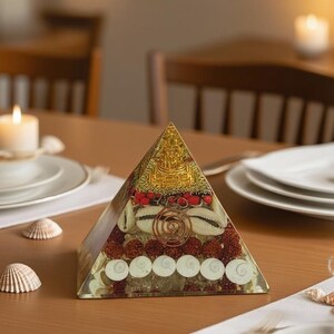 “clear quartz chips on pyramid base for chakra balancing and healing”