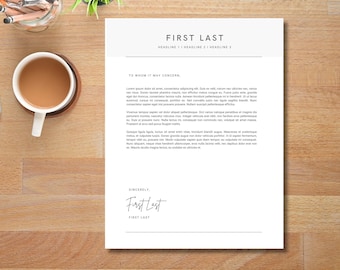May include: A white letterhead with the text "FIRST LAST" and "HEADLINE 1 HEADLINE 2 HEADLINE 3". The text "TO WHOM IT MAY CONCERN" and a signature are also visible. A cup of coffee sits on a wooden table.