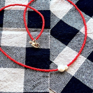 Red beaded necklace with freshwater pearls