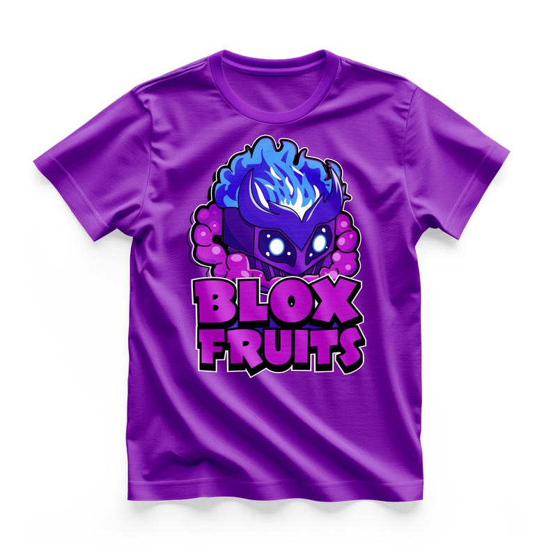 May include: Purple t-shirt featuring a graphic of a character with a blue flame-like design and the text "BLOX FRUITS" in purple and white. The shirt is a solid purple color.